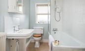 Daffodil Cottage - family bathroom with WC, basin and bath with shower over