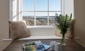 Dipper Cottage - window seat in bedroom one enjoys stunning views