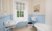 Edenside House - family bathroom with roll top bath and shower over, WC and basin (1)