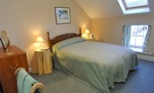 Ellemford Estate - bedroom six with double bed, chest of drawers and side tables
