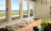 Captain's Landing - enjoy meals around the table with views of Bamburgh