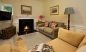 The White House - comfortable seating in the sitting room where guests can relax in front of the fire