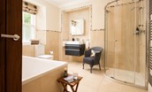 Pentland Cottage - the spacious bathroom with bath, walk-in shower, WC and basin