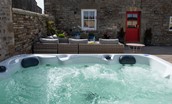 Fell End - hot tub and outdoor seating is provided for guests enjoyment