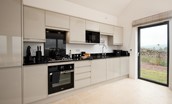 The Maple - well-equipped modern kitchen with integrated dishwasher, fridge/freezer, washing machine and microwave