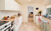 Fisherman's Cottage - kitchen with stool seating area