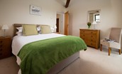 East Lodge - king size bed and feature beams in bedroom two (1)