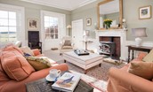 Halliburton - drawing room with ample seating and views over the garden