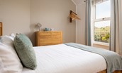 Driftwood Bamburgh - bedroom one with king size double bed and views out to the dunes