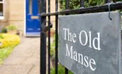 The Old Manse - slate signage on the wrought iron gate into the front garden