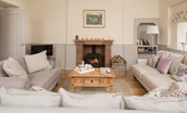 Monteviot Stables West - sitting room with wood burning stove