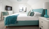Duneside House - bedroom two with king size bed, wardrobe, chest of drawers and Smart TV