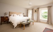 Wark Farmhouse - bedroom four with super king bed and side tables