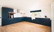 Westwood Cottage - newly fitted Shaker-style kitchen with large six-ring induction hob and Belfast sink