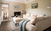 Seaview House - Annexe sitting room with steps leading down to the bedroom