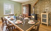 Overthwarts Farmhouse - dining table & wood burning stove