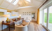 Fenton Lodge - open-plan living area with double height ceiling