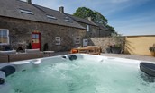 Fell End - hot tub situated in the rear courtyard