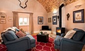 Lakeside Cottage - Edward - the arched ceilings have been left exposed, adding character to this cosy room