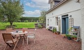 Trouthouse - the garden benefits from an enclosed lawned garden with gravelled outdoor dining/seating area