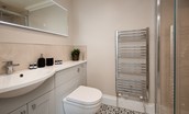 Brockmill Farmhouse - en-suite shower room with rainfall shower head, WC, heated towel rail and basin with illuminated mirror