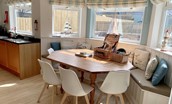 Driftwood Bamburgh - dining area seating 8 set within the bay window