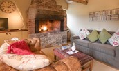The Smithy, Crookham - sitting room fireside