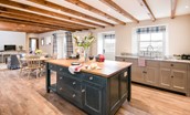 Crookhouse Mill - beautiful handcrafted kitchen with island, door to the garden, dining table and snug area with TV