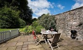Garden Cottage - the pretty patio area at the rear of the cottage with garden furniture and barbecue