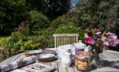 Garden Cottage - enjoy coffee in the sunny garden