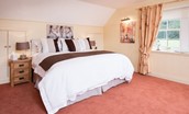 Dryburgh Farmhouse - bedroom three with zip and link beds, configured as a super king or twin, as preferred