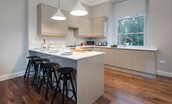 Barclay House - the contemporary kitchen with breakfast bar and seating for four