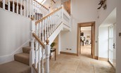 Beeswing - hallway leading to open-plan living and dining area