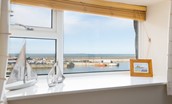 Farne View - windowsill details in bedroom two with views out to the harbour