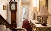 The Old Manse - entrance hallway with grand staircase and antique furniture