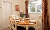 Kilham Cottage - dining room with wooden dining table