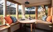 The Dovecot at Reedsford - enjoy superb countryside views with the sun streaming in while you relax on the bench seating