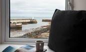 Wamsas Retreat - enjoy a cup of something while watching the boats coming and going from the harbour