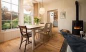 Trouthouse - the open-plan living space leads through from the kitchen and benefits from a large bay window overlooking the owner's garden to the rear