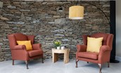 Blackhouse Forest Estate - large wing-backed armchairs in the bright atrium