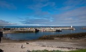 The harbour at nearby Seahouses (2.2 miles)