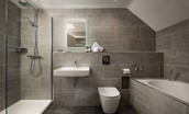 Lucy - en suite bathroom with large walk in shower and separate bath