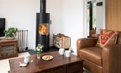 The Willow - unwind in the cosy seating area infront of the modern wood burning stove