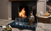 Wood Cottage - relax in front of the fire with a glass after a busy day exlporing