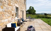 Lowtown Cottage - bench seating and coffee table are provided for morning tea outside or a cooling drink in the evenings