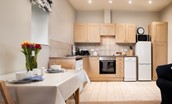 The Bothy at Cheswick - spacious kitchen area with all the essentials for your self-catered stay