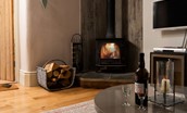 The Old Paper Mill - snuggle up in front of the cosy log burner in the sitting room while enjoying a glass of wine