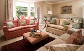 Wark Farmhouse - ample seating for the whole party in the drawing room