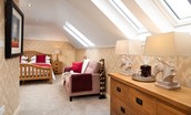 Dryburgh Steading One - bedroom one with velux windows flooding the room with natural light