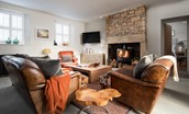 The Gallery - warm and cosy sitting room with ample seating, Smart TV and wood burner